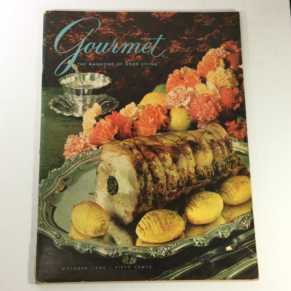 Cover of VTG Gourmet: The Magazine of Good Living, October 1965, featuring a beautifully plated roast with garnishes, reflecting vintage culinary art.