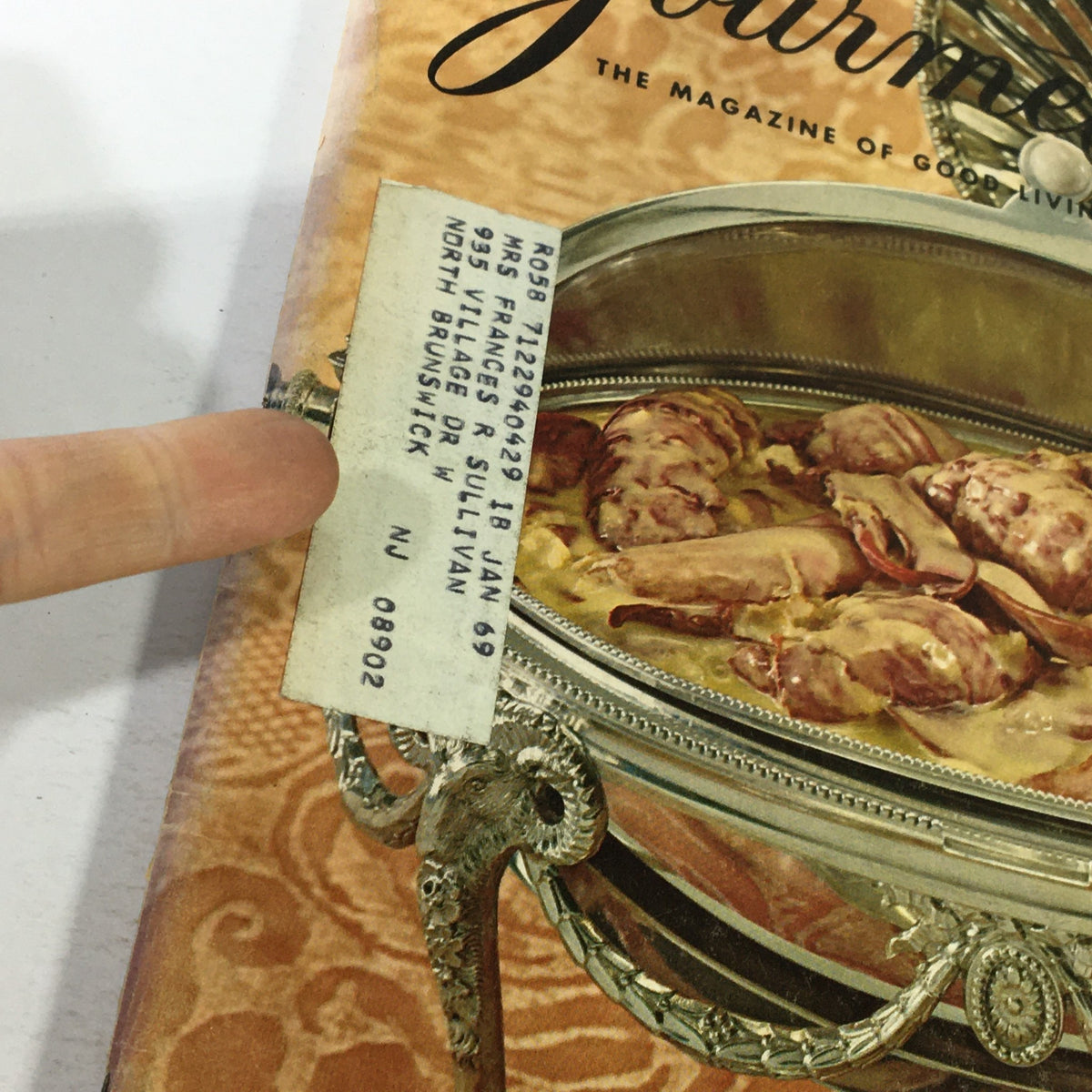Close-up of the cover of VTG Gourmet The Magazine of Good Living May 1968 showing a mailing label from a previous subscriber.