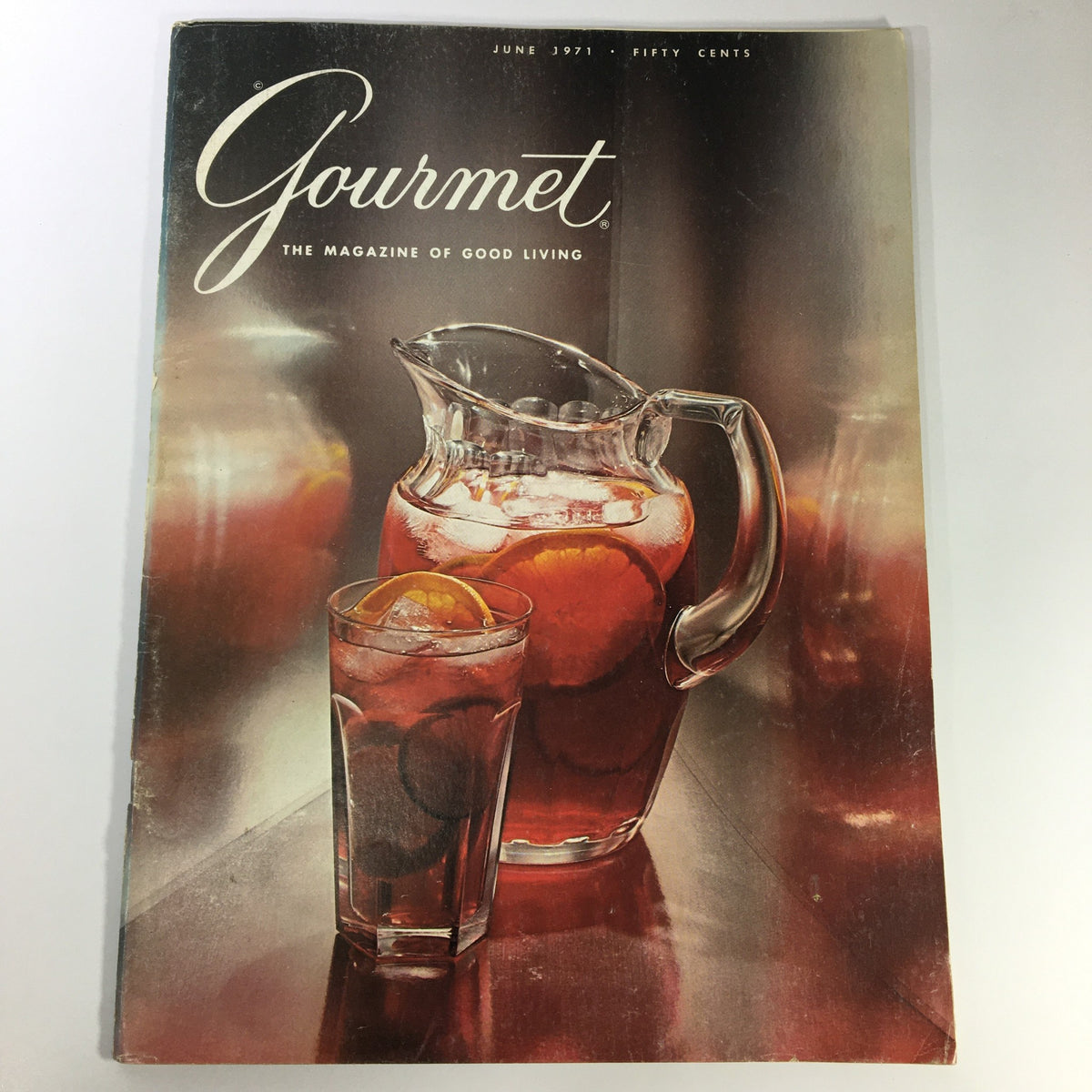 Cover of VTG Gourmet The Magazine of Good Living June 1971 showcasing a pitcher and glass filled with a refreshing beverage, highlighting Seattle's culinary scene and vintage food culture.