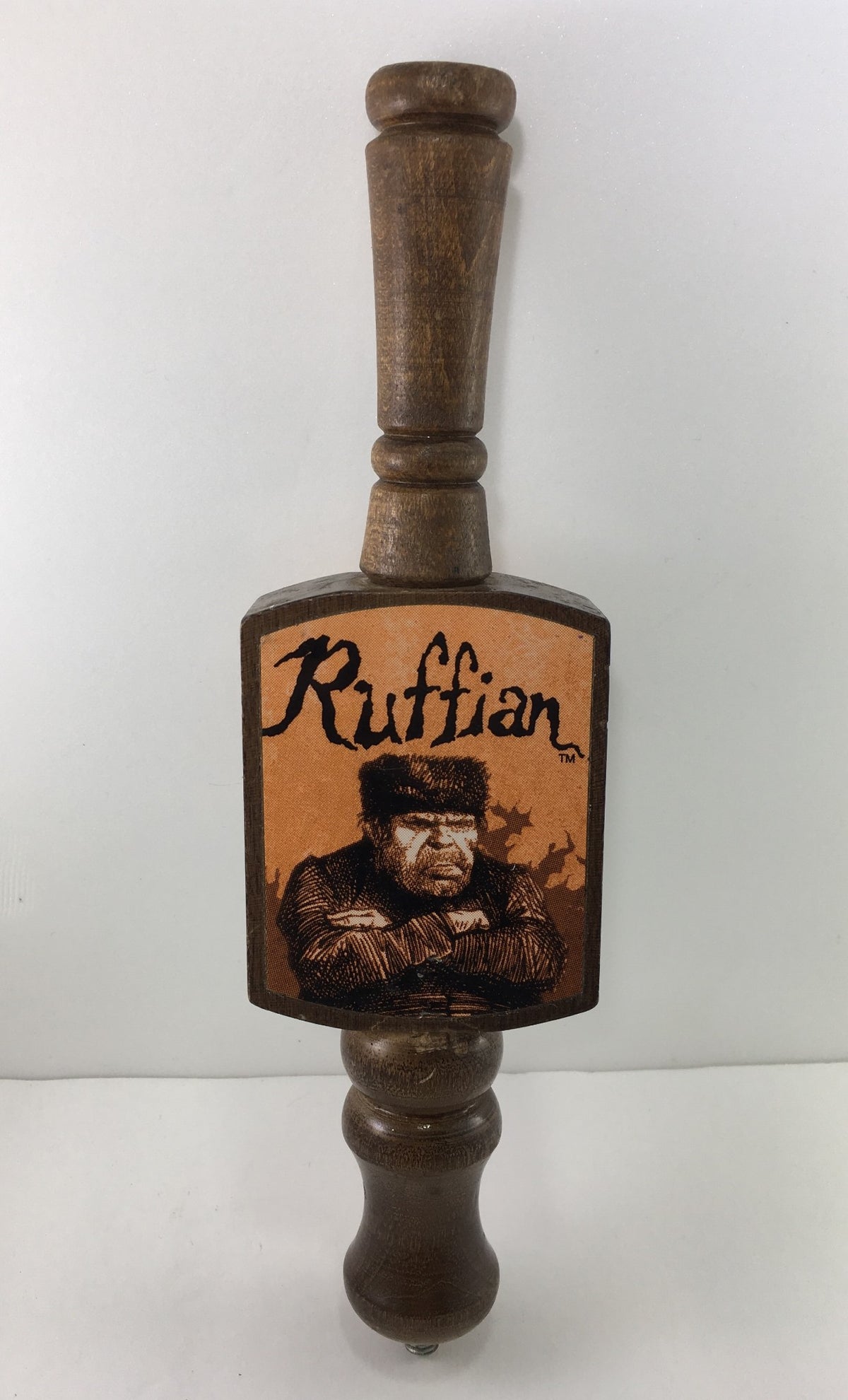 Vintage Ruffian Porter Wooden 10" Beer Tap Handle featuring a rustic design with a detailed illustration of a rugged character, ideal for collectors and beer enthusiasts.