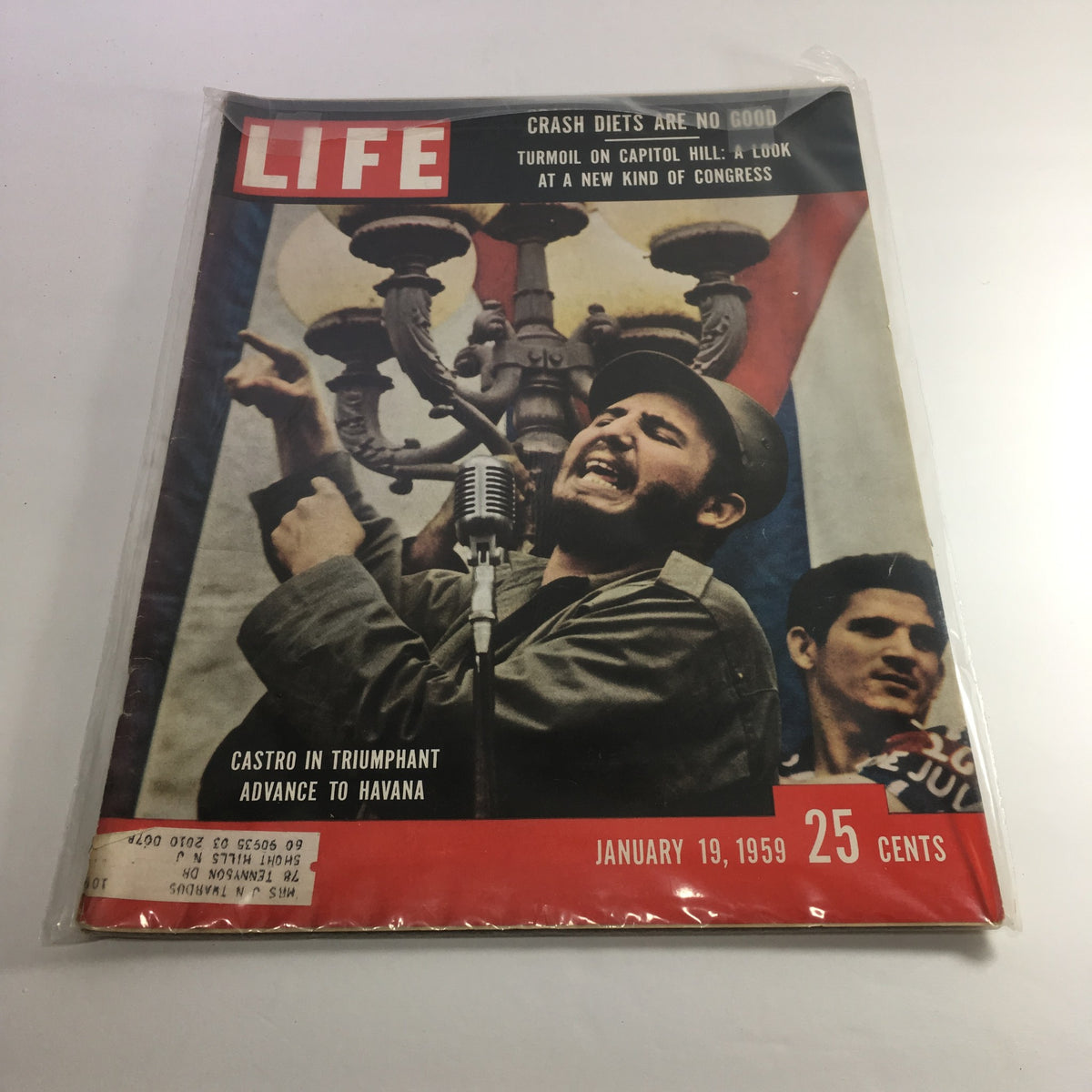Life Magazine cover from January 19, 1959, featuring Fidel Castro during his triumphant advance to Havana, showcasing historical significance and vintage appeal.