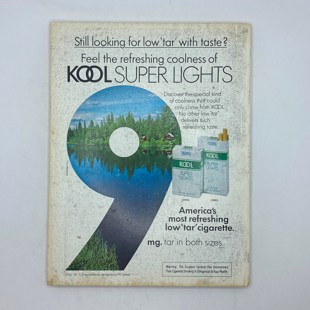 Back cover of Street & Smith's Baseball Official Yearbook 1979 featuring an advertisement for Kool Super Lights cigarettes, showcasing a picturesque nature scene.