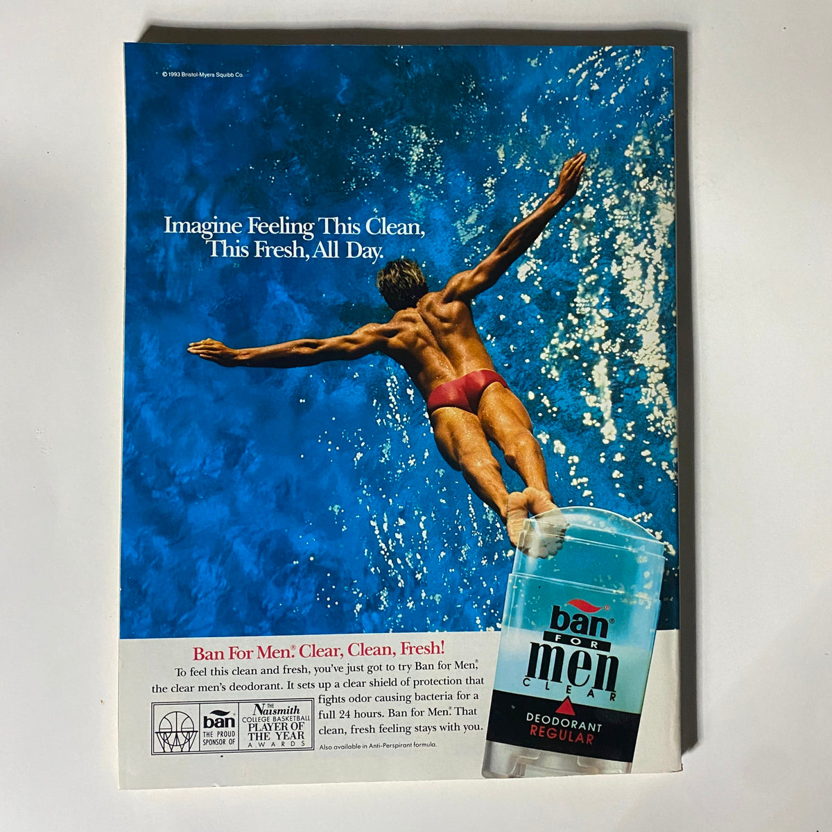Back cover of Street & Smith's College/Prep Basketball 1993-1994 with an advertisement for Ban for Men deodorant, featuring a swimmer diving into a blue pool, promoting freshness and cleanliness.