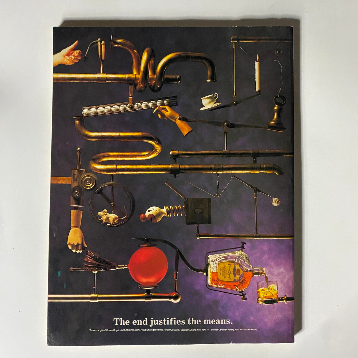 Back cover of Street & Smith's Pro Basketball Magazine with a unique artistic design and the quote 'The end justifies the means,' complementing its vintage appeal.