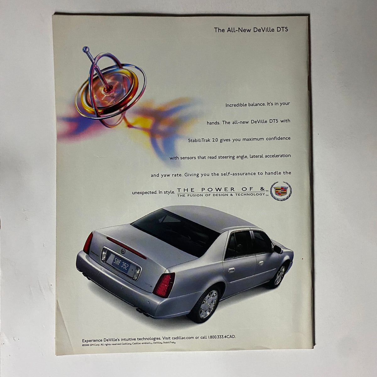 Advertisement for the All-New DeVille DTS featuring its sleek design and advanced technology, showcasing the Cadillac logo and emphasizing the blend of style and performance.