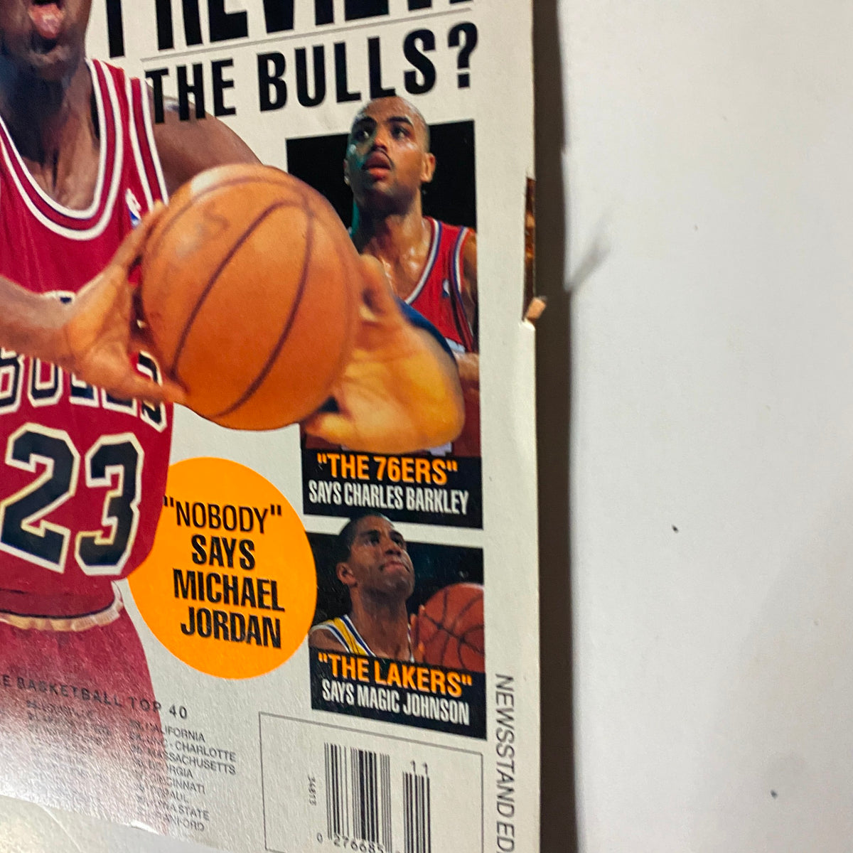 Detailed close-up of the Sport Magazine November 1991 cover featuring Michael Jordan, showcasing his quote 'Nobody' and including images of Charles Barkley and Magic Johnson, emphasizing basketball predictions.