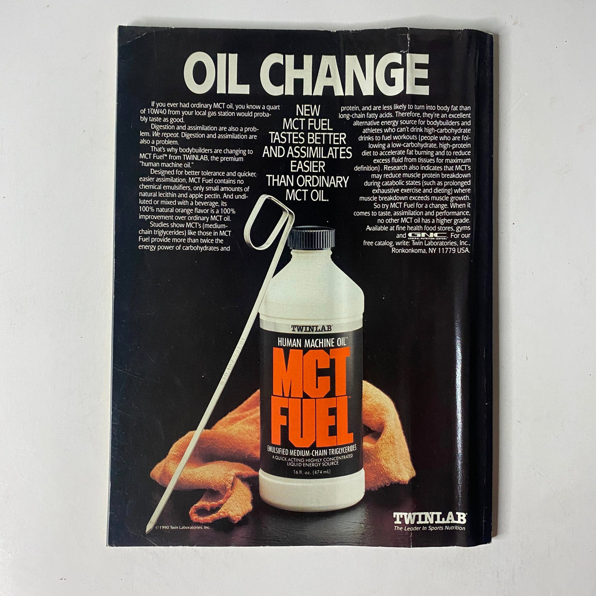 Back advertisement for MCT Fuel in MuscleMag International Magazine November 1990, promoting nutritional supplements for bodybuilders.