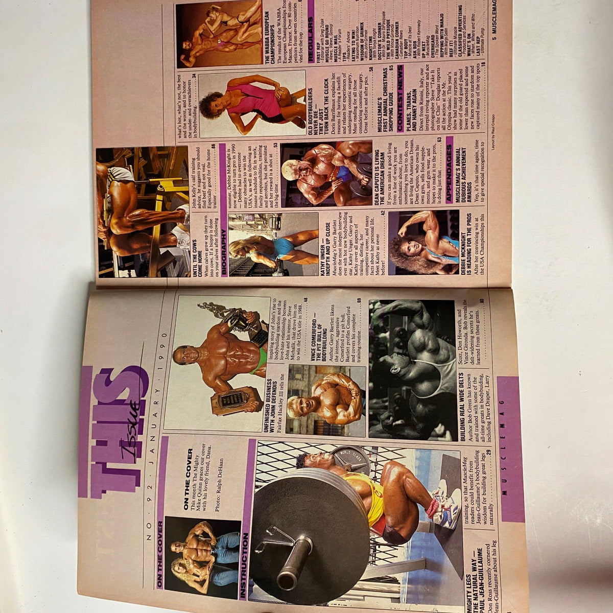 Inside spread of MuscleMag International Magazine January 1990 No. 92, featuring contest coverage and profiles of bodybuilders, illustrating the magazine's focus on bodybuilding.
