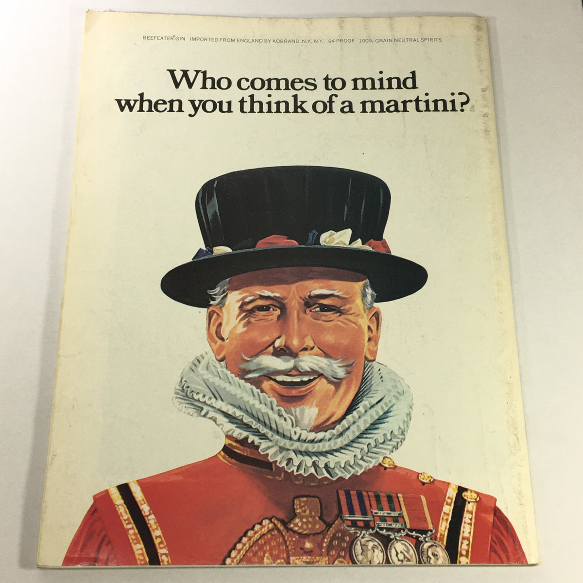 Back cover of VTG Gourmet The Magazine of Good Living March 1976, featuring an illustration of a smiling gentleman in a bowler hat, with a playful caption about martinis.