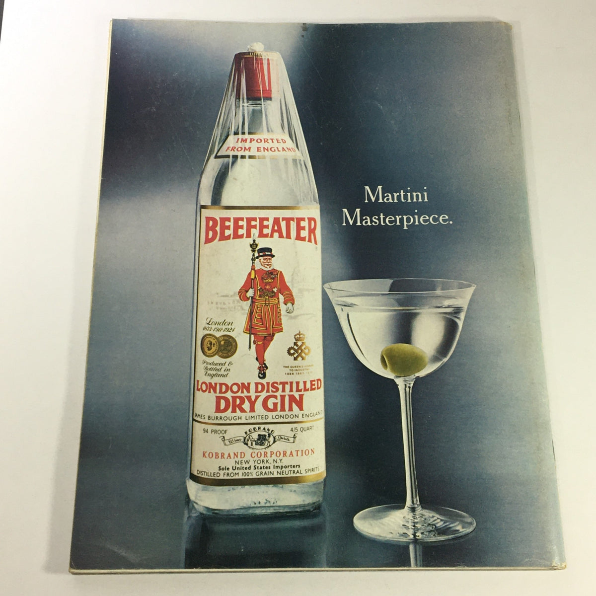 Advertisement for Beefeater London Distilled Dry Gin in VTG Gourmet The Magazine of Good Living March 1977, showing a bottle and a martini glass, emphasizing the magazine's culinary focus.