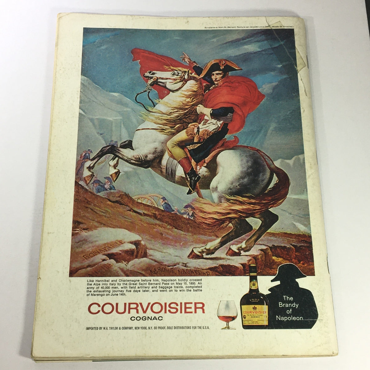 Back cover of VTG Gourmet The Magazine of Good Living November 1974 showcasing a vibrant advertisement for Courvoisier Cognac, featuring Napoleon on horseback.
