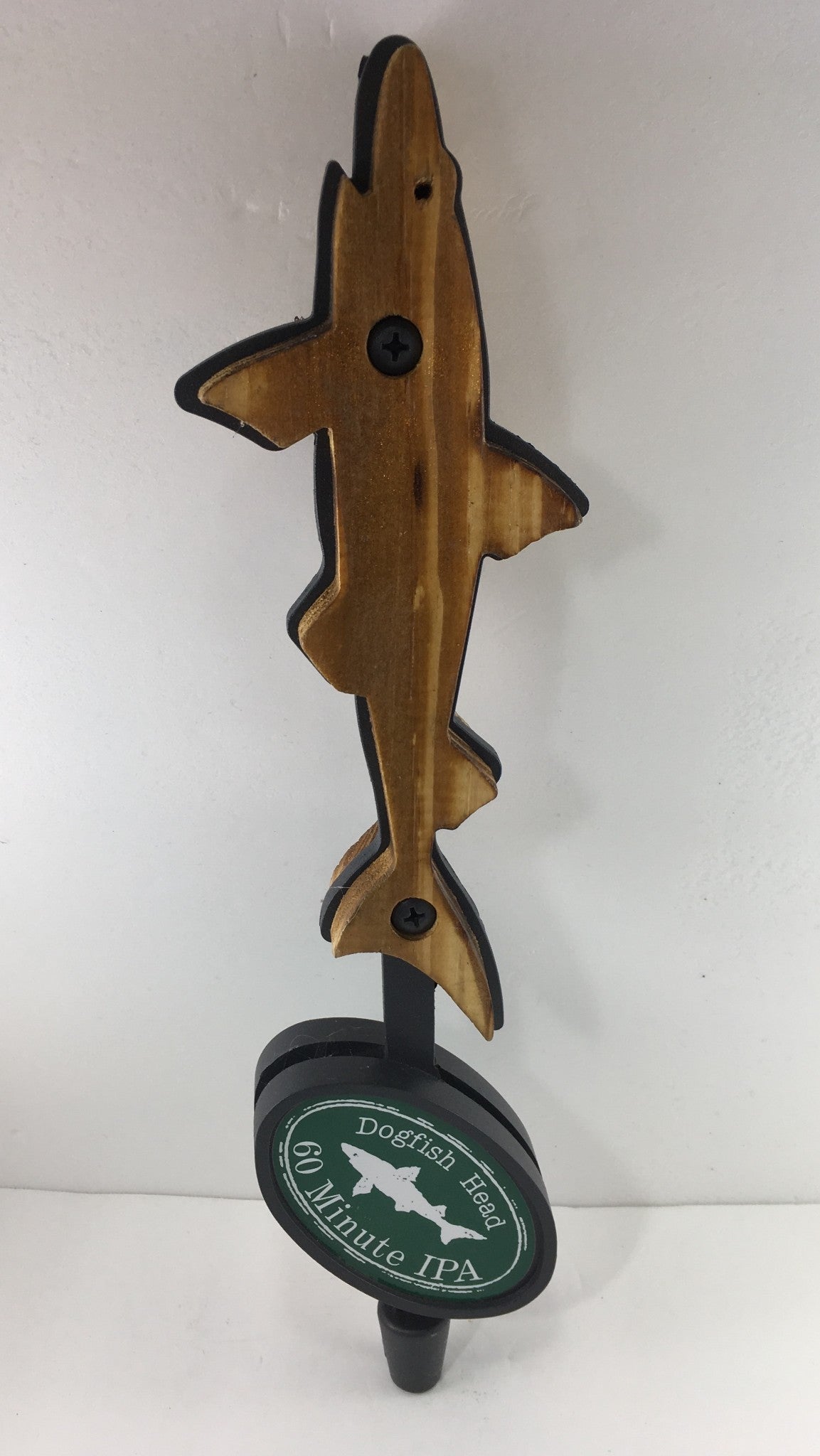 Vintage Dogfish Head 60 Minute IPA 12" Beer Tap Handle featuring a wooden shark design, perfect for beer enthusiasts and collectors.