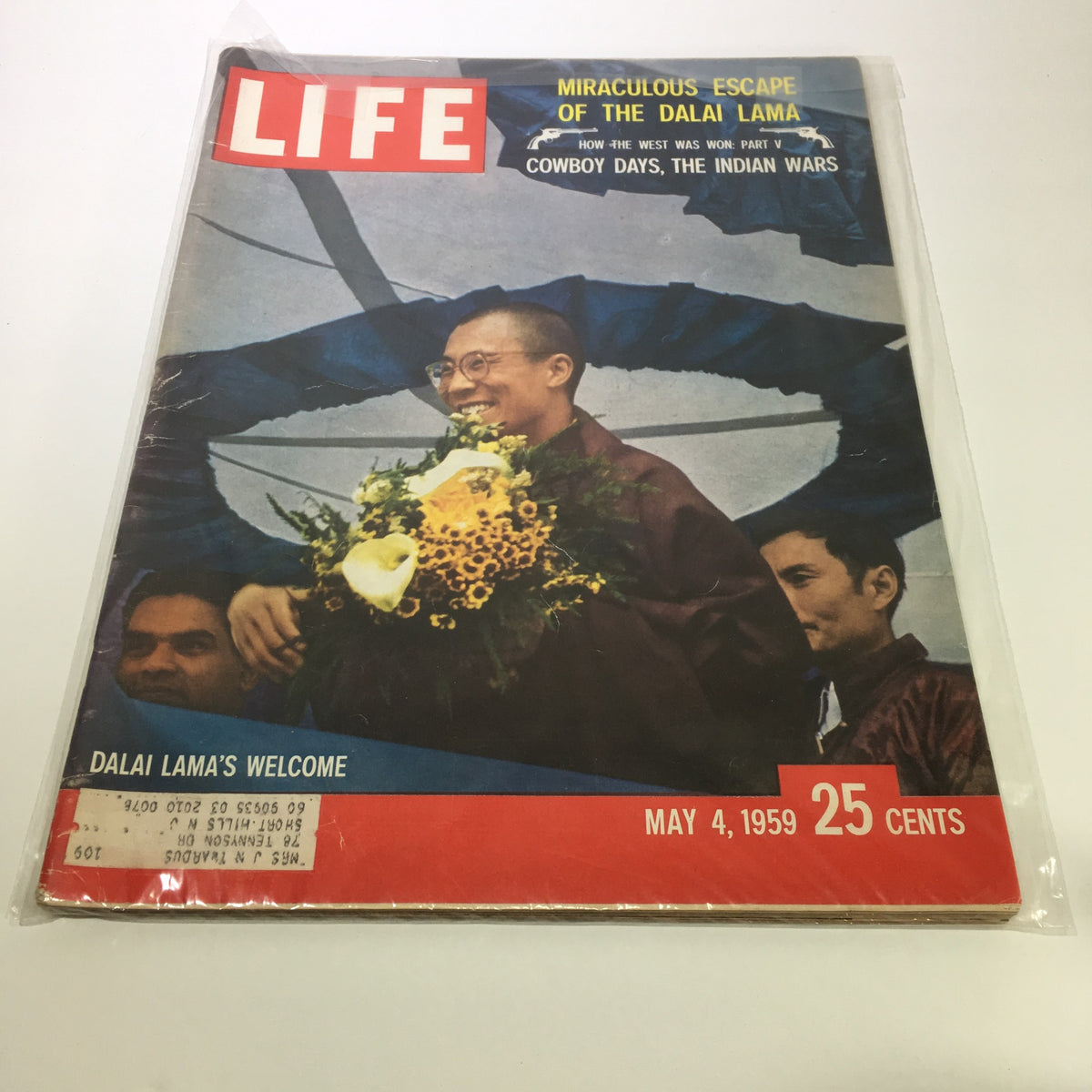 Cover of VTG Life Magazine May 4 1959 featuring the miraculous escape of the Dalai Lama, with a smiling Dalai Lama holding a bouquet surrounded by supporters, showcasing vintage magazine art.