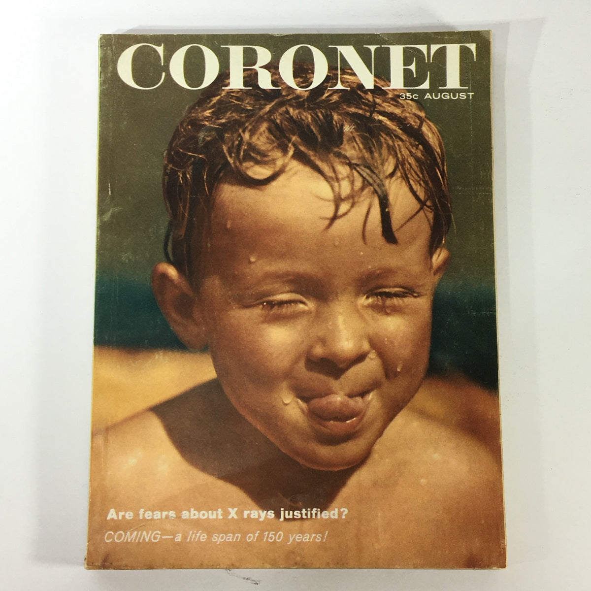 VTG Coronet Magazine cover from August 1959, featuring a playful child with wet hair, showcasing the title 'Coronet', and the theme 'Coming A Life Span of 150 Years', highlighting its vintage appeal.