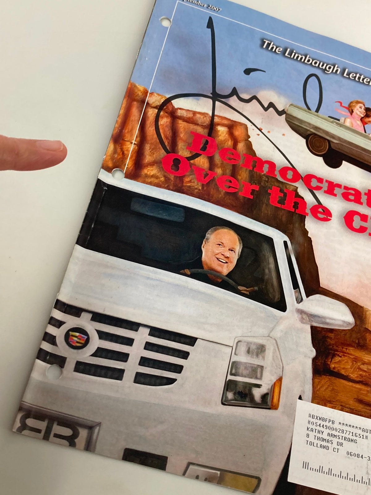 Close-up view of the Rush Limbaugh Letter Newsletter Magazine September 2007 cover, highlighting Rush Limbaugh driving a car with the slogan 'Democrats Over the Cliff', showcasing the magazine's signature style and political themes.