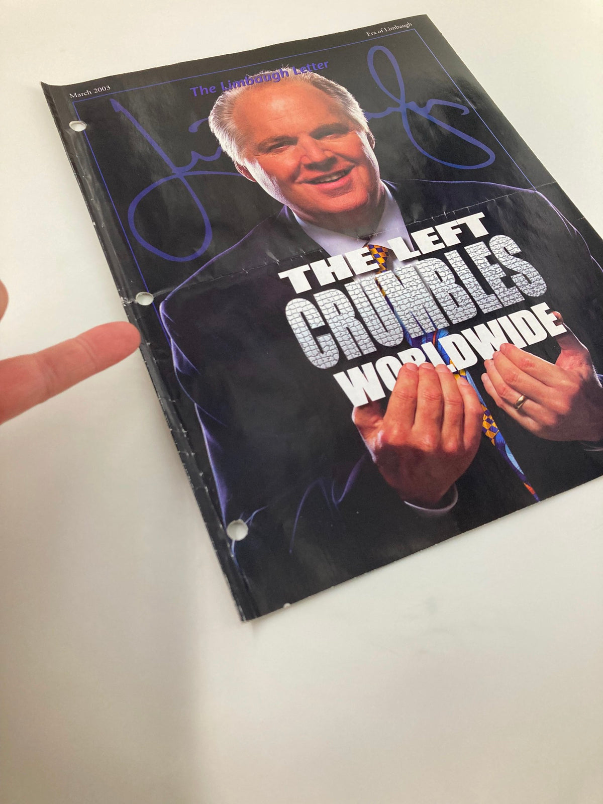 Close-up of the cover of Rush Limbaugh Letters Newsletter Magazine March 2003, showing the title 'The Left Crumbles Worldwide' and Rush Limbaugh's signature.