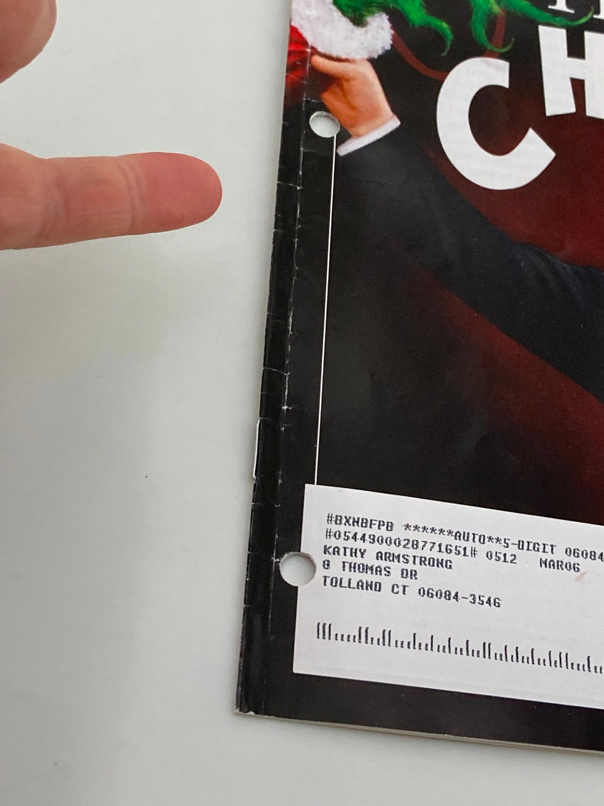 Close-up of the December 2005 Rush Limbaugh Letter Newsletter Magazine showing the edge with hole punches for binder storage.