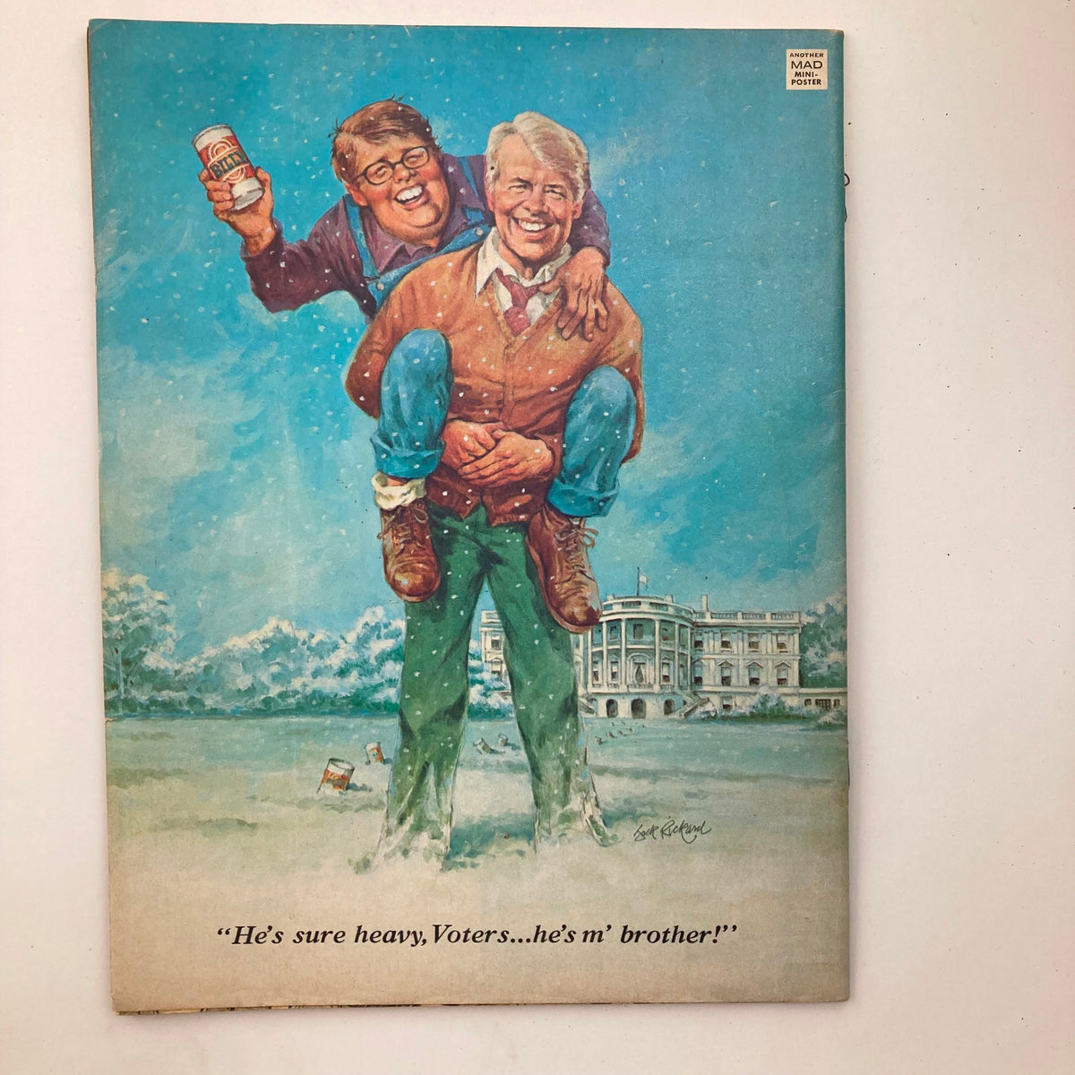 Cover of Mad Magazine September 1979, No. 209 featuring a humorous illustration of two characters in a snowy landscape, one character giving a piggyback ride while holding a can, with the caption "He's sure heavy, Voters...he's m' brother!" This vintage magazine is a collectible piece reflecting the humor of the 1970s.