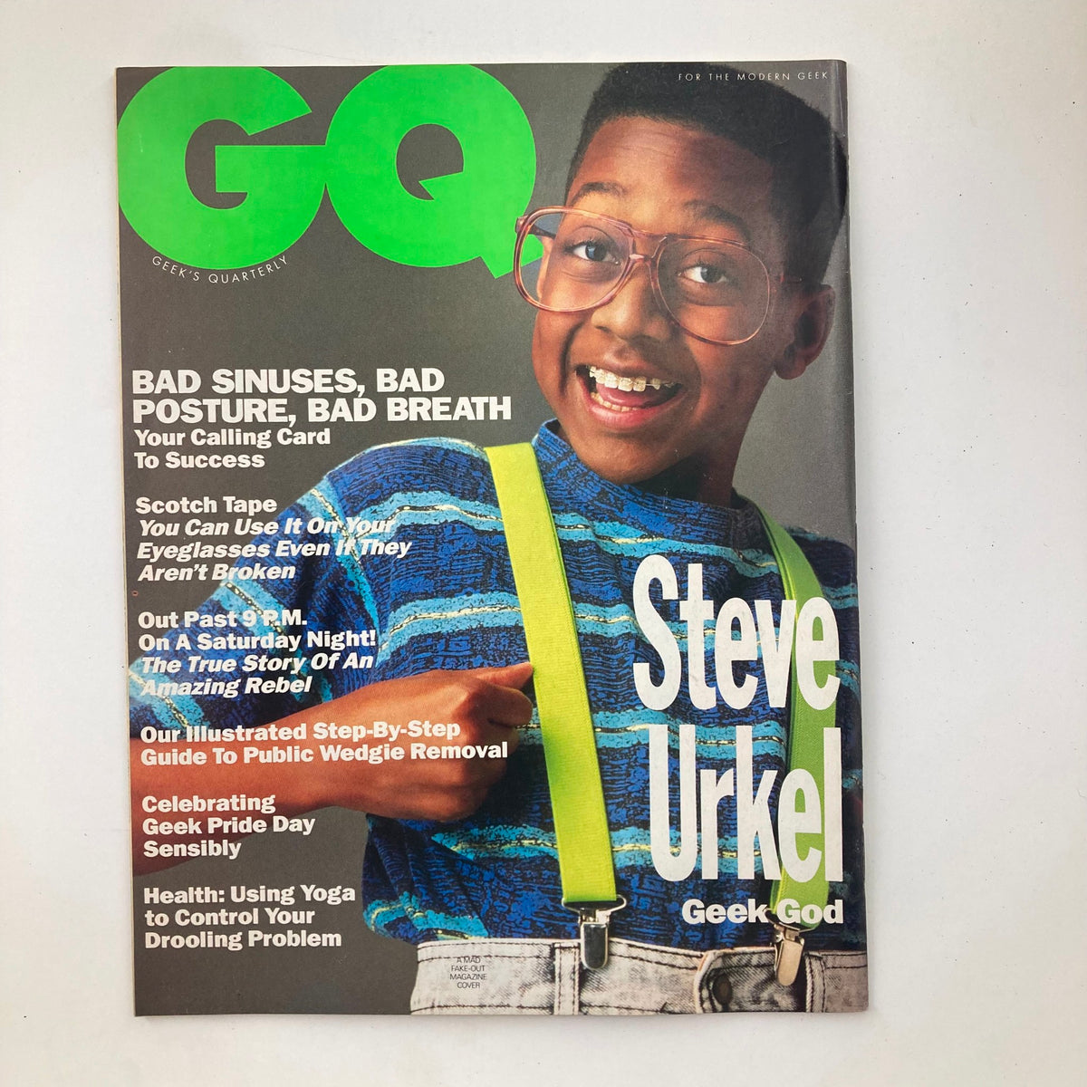 GQ Magazine featuring Steve Urkel on the cover, highlighting humor and geek culture. March 1992 issue, showcasing articles on bad sinuses, posture, and public wedgie removal.