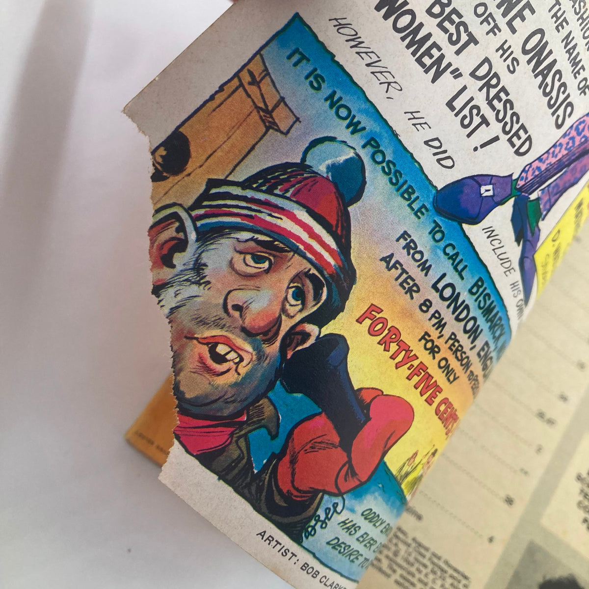 An interior page from Mad Magazine January 1970 No. 132, showcasing a humorous caricature of a man in a colorful winter hat and mittens, highlighting the magazine's ironic and satirical artwork.