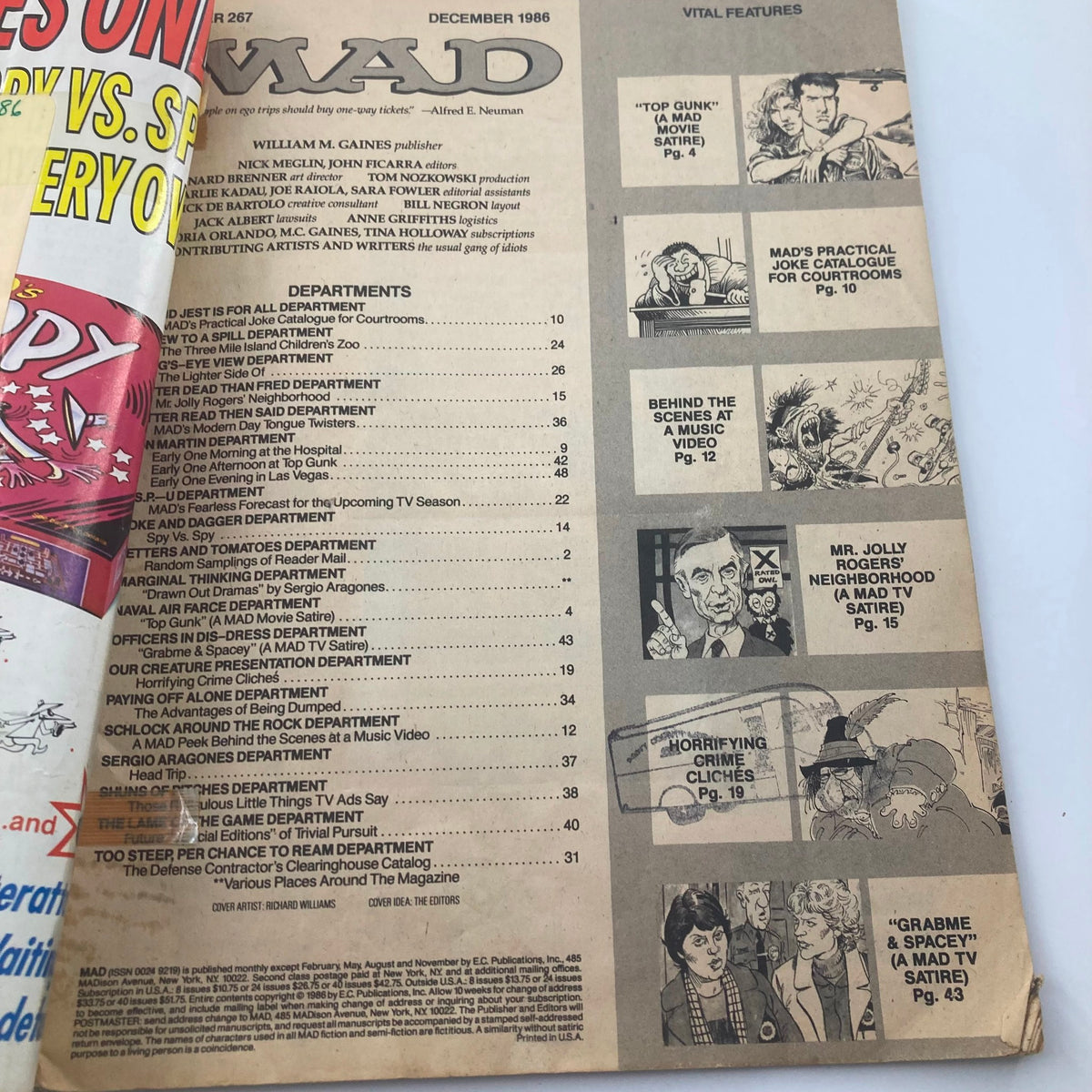 Close-up of the table of contents from Mad Magazine December 1986 No. 267, listing departments and features including 'Top Gunk' and 'Mr. Jolly Roger's Neighborhood.'
