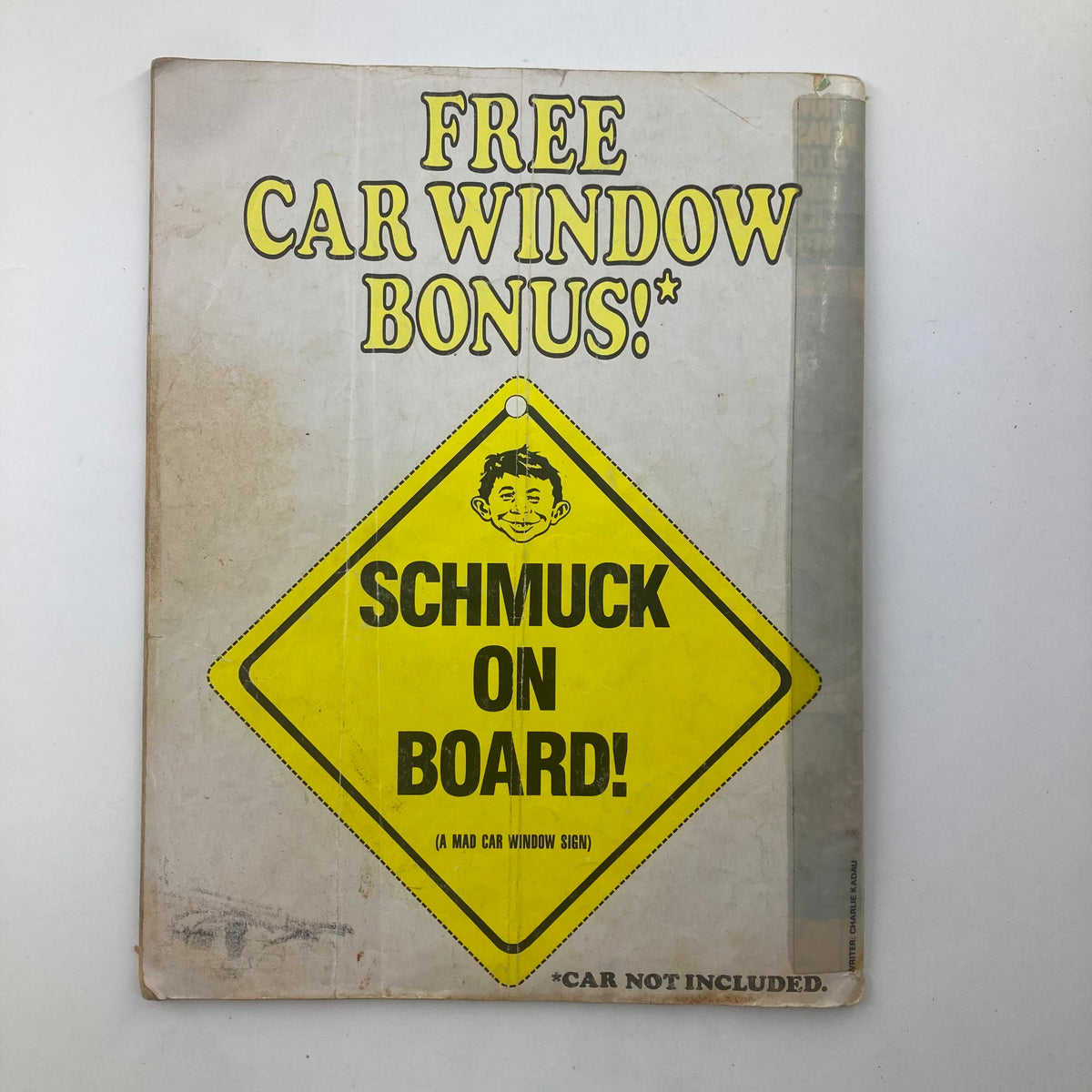Mad Magazine December 1986 No. 267 cover featuring a humorous car window bonus sign that reads 'Schmuck On Board!' highlighting the vintage pop culture theme.