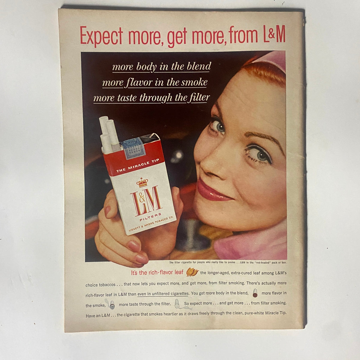 Vintage advertisement from Motor Trend Magazine featuring L&M Filters cigarettes with a model, emphasizing flavor and quality. Title: VTG Motor Trend Magazine January 1962 Dodge Dart and Chevy II No Label VG.
