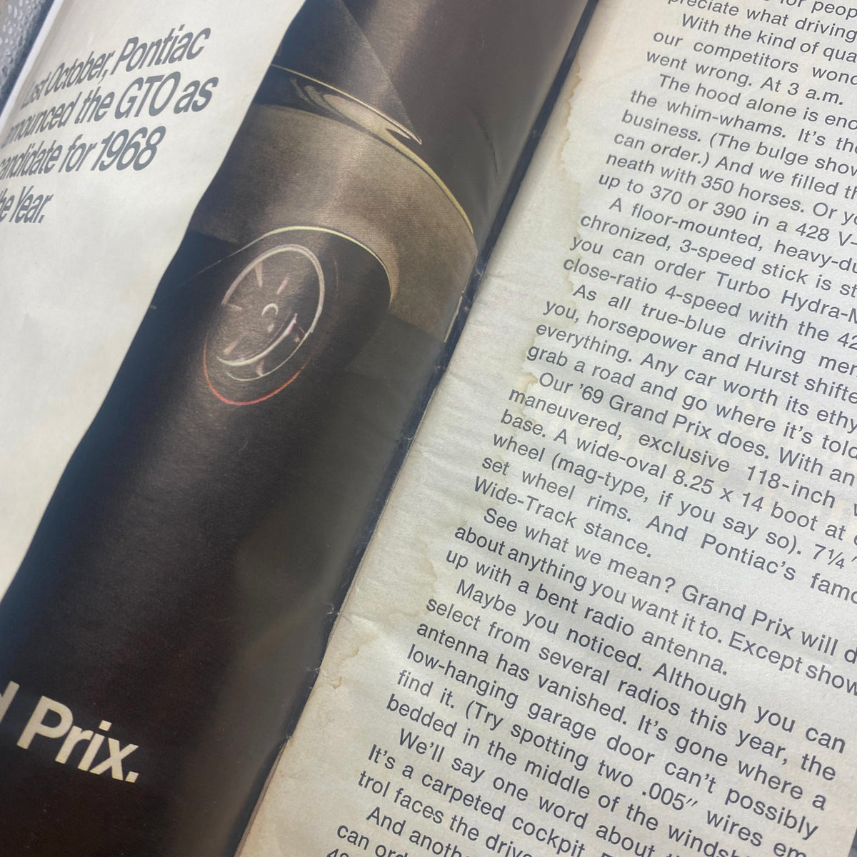 Interior of Motor Trend Magazine October 1968 featuring a detailed road test section, showcasing Mopar models including the Grand Prix. VTG Motor Trend Magazine October 1968 First Full Road Test Mopar 340 No Label.