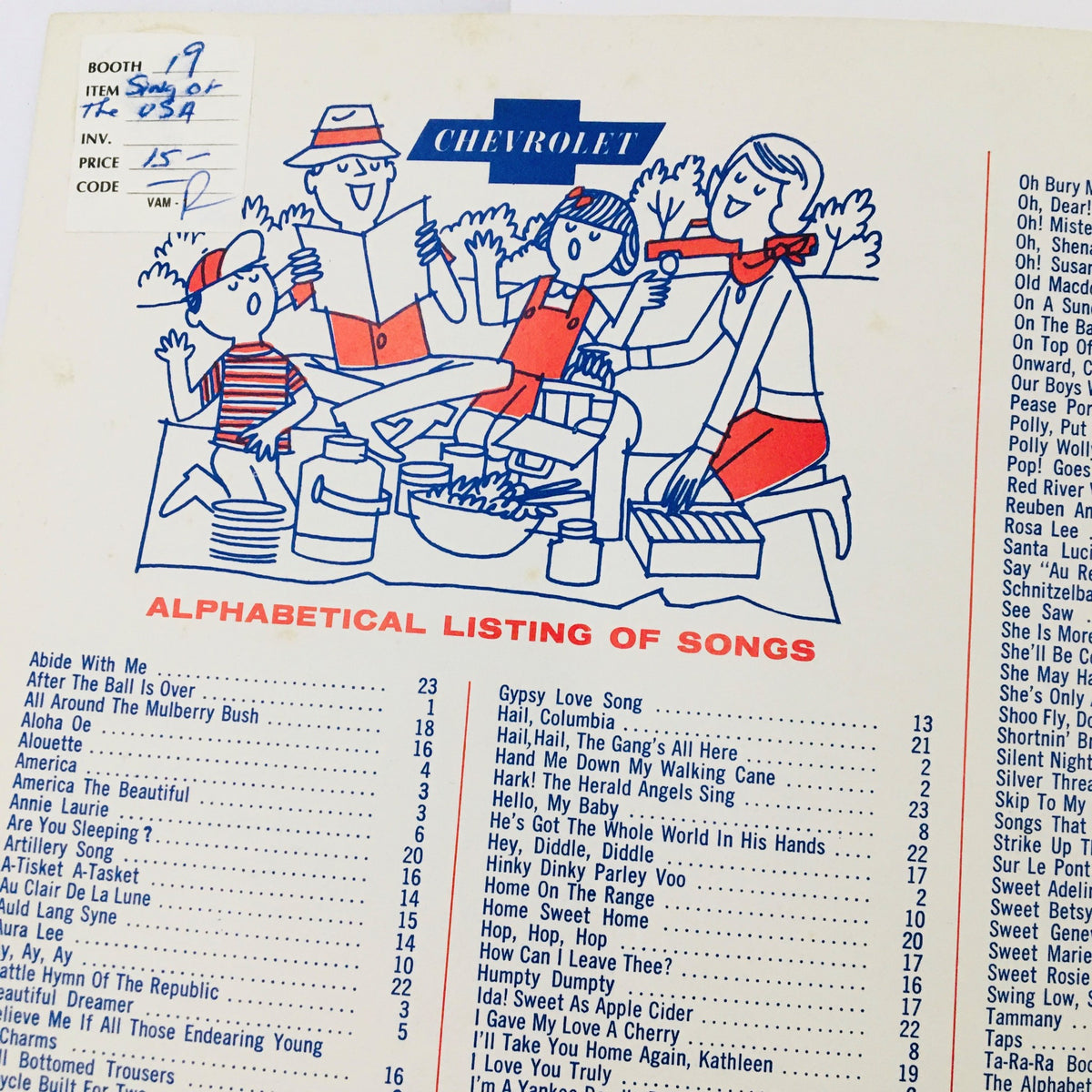 Back cover of the 1964 Sing of the U.S.A. with Chevrolet Song Book displaying an alphabetical listing of songs and family picnic illustration.