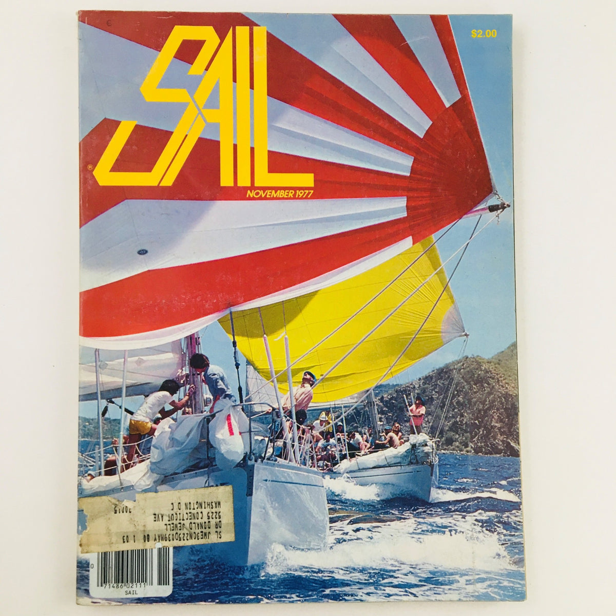Cover of Sail Magazine November 1977 featuring the Swan 44 Jibaro racing ahead of Gitana with vibrant sails in the background.