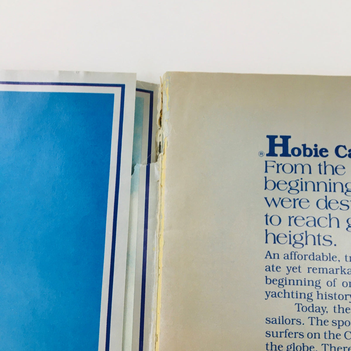 Close-up view of the spine and pages of Sail Magazine January 1980: The Breakthrough Boats & Surfing the New Wave, showcasing details and wear consistent with vintage magazines.