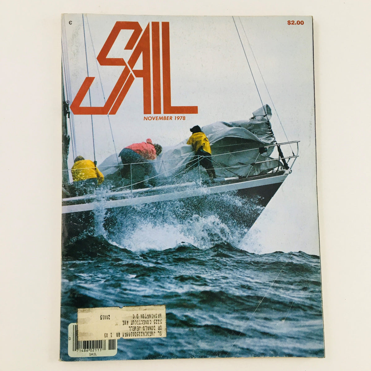 Cover of Sail Magazine November 1978, featuring sailors in yellow rain gear on a boat in rough waters with a prominent magazine title.