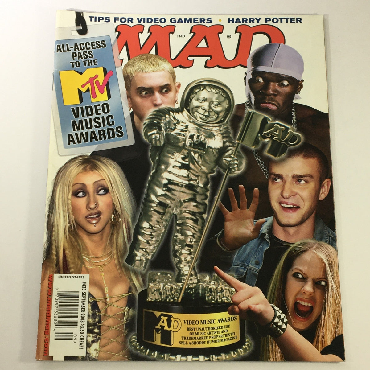 Cover of Mad #433 September 2003 featuring iconic pop culture figures including Christina Aguilera, Eminem, Avril Lavigne, and 50 Cent, showcasing a collectible vintage magazine from the early 2000s.