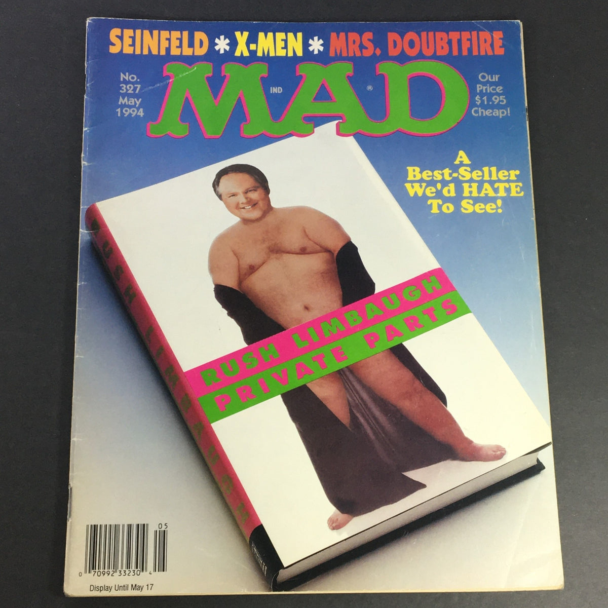Cover of Mad #327 from May 1994 featuring Rush Limbaugh in a humorous pose with the text 'Private Parts', alongside references to Seinfeld and Mrs. Doubtfire, emphasizing its status as a best-seller.
