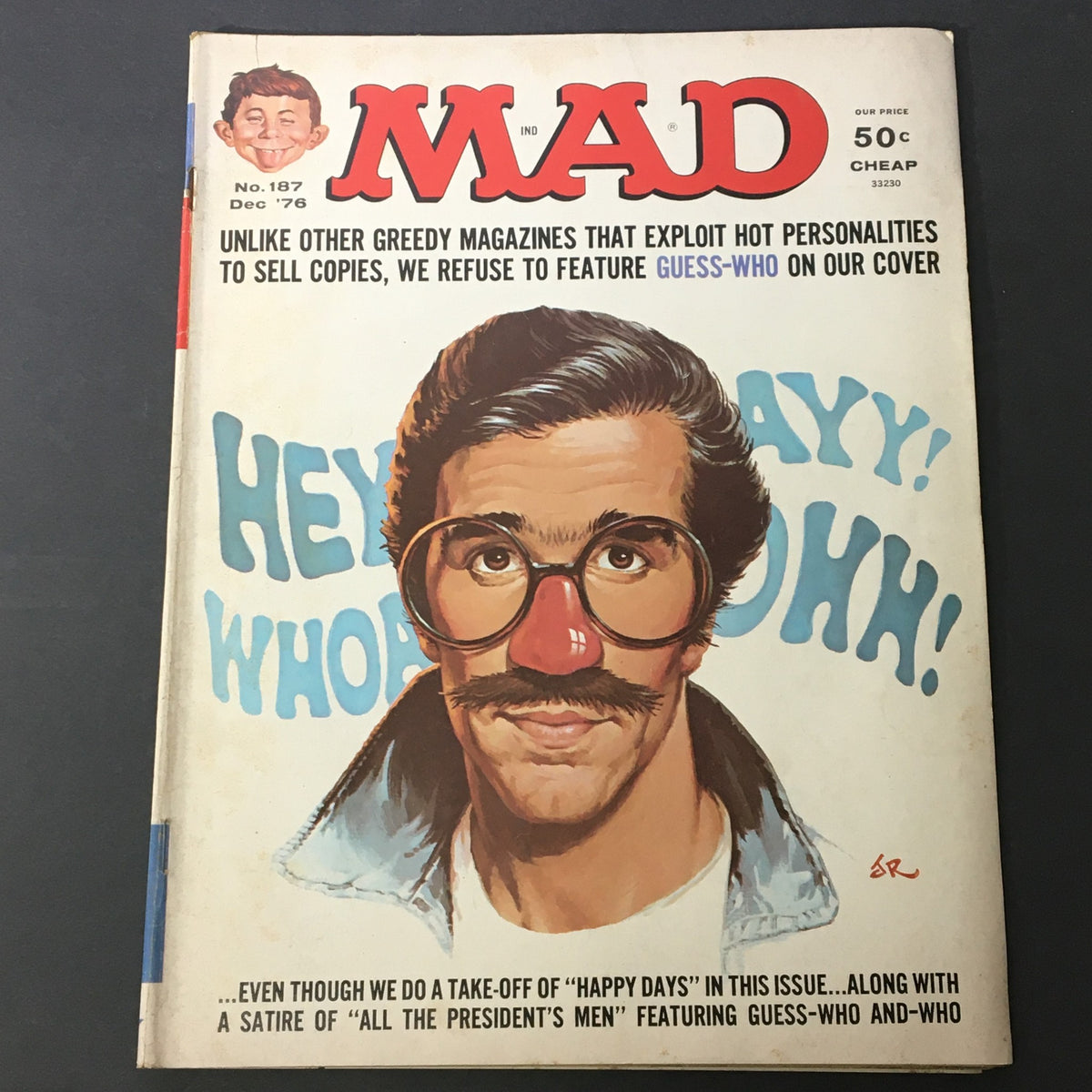 Cover of Mad #187 December 1976 featuring Henry Winkler as the Fonz in a humorous pose, highlighting classic pop culture elements with the tagline 'HEY WHOOO!' and a satirical note.