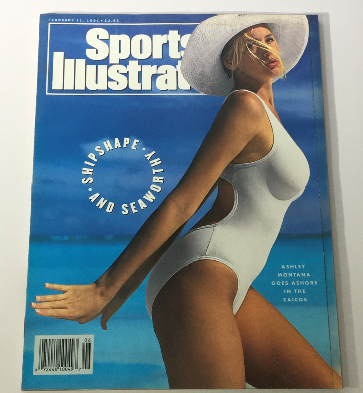 Cover of Sports Illustrated Magazine dated February 11, 1991, featuring model Ashley Montana in a white swimsuit against a tropical backdrop of the Caicos Islands.