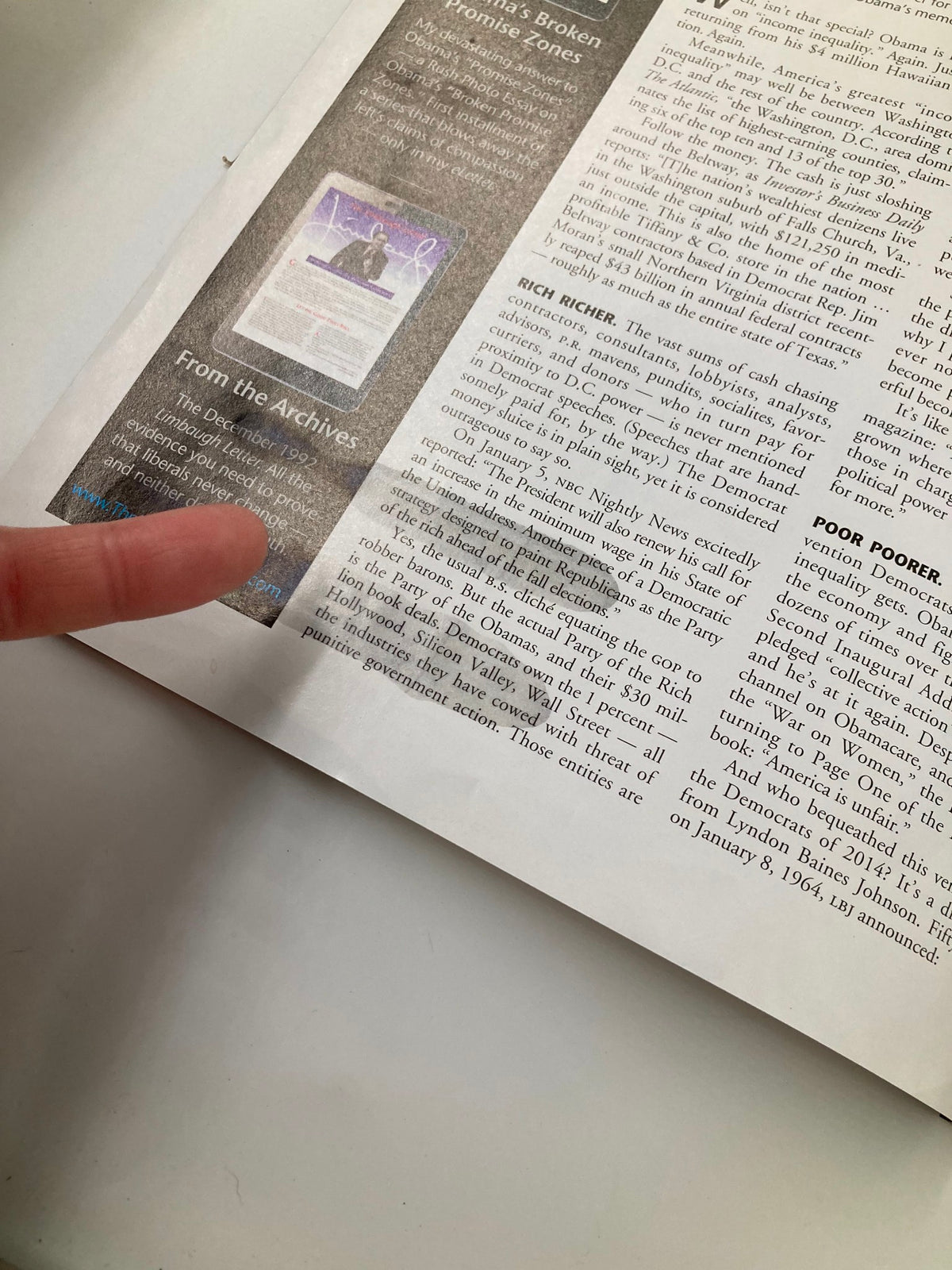 Detailed view of an article in the Rush Limbaugh Letter Newsletter Magazine February 2014 titled 'Who's Keeping The Poor Poor?', focusing on commentary related to poverty.