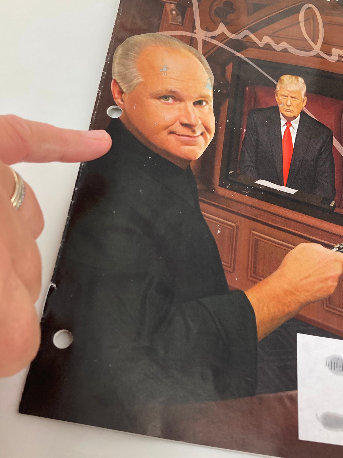 Detailed view of the cover of Rush Limbaugh Letter Magazine October 2016 highlighting Rush Limbaugh's image and hole punch from previous storage.