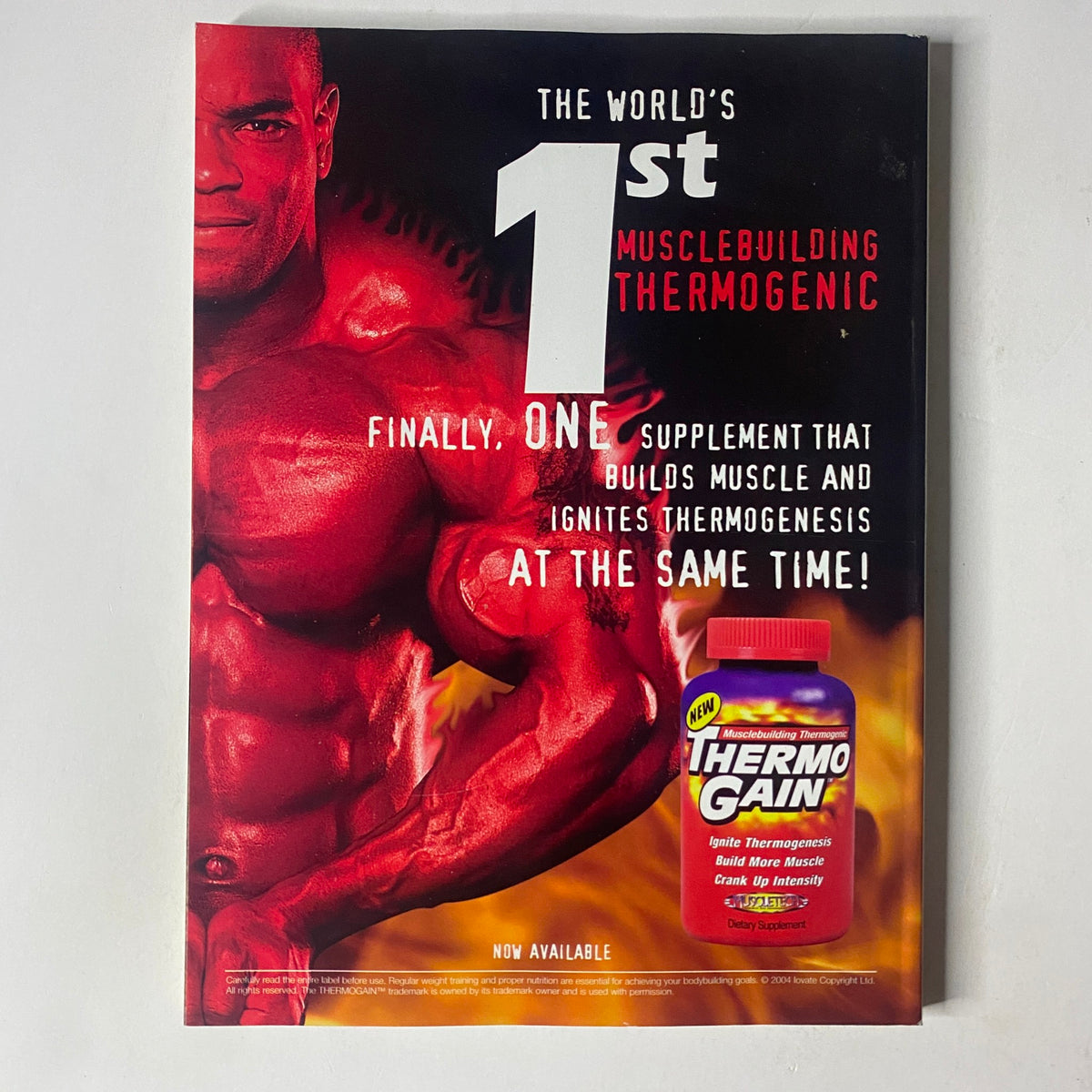 Advertisement from MuscleMag International Magazine February 2005 promoting Thermo Gain, a bodybuilding supplement that aids in muscle building and thermogenesis.