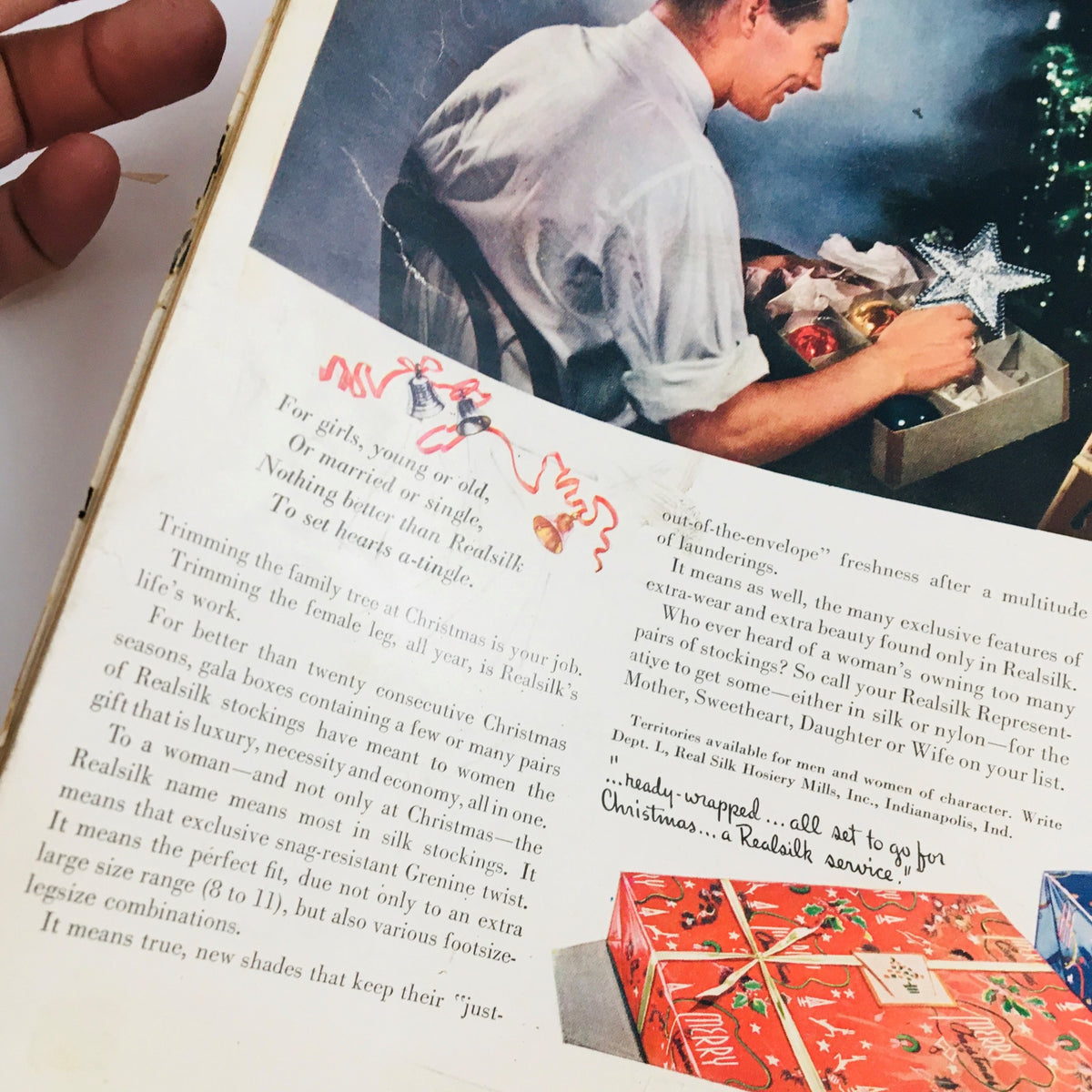 Interior page of the VTG Life Magazine from November 25, 1940, featuring a Christmas-themed advertisement with a man preparing decorations.