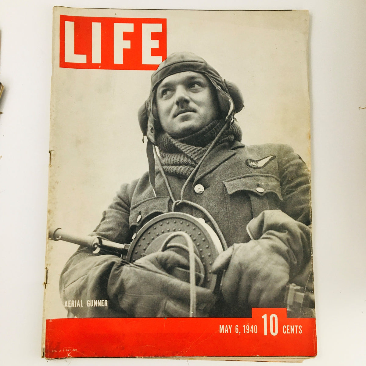 Cover of VTG Life Magazine May 6, 1940 featuring a photograph of an aerial gunner in military attire, showcasing wartime equipment and a vintage design.