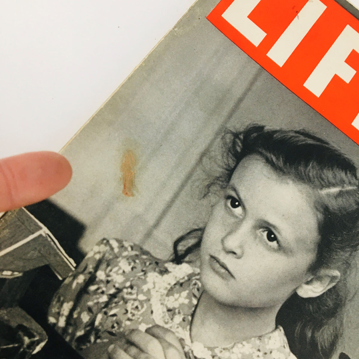 Close-up of a vintage Life magazine cover from June 2, 1941, featuring a boy and a girl praying in Sunday School, with visible wear including a blemish and distinct vintage texture.