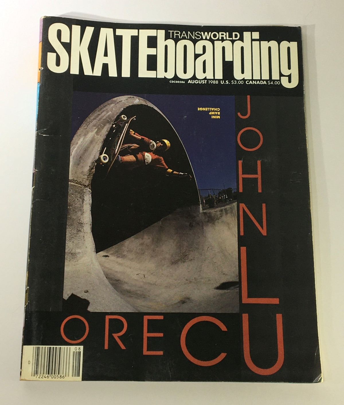 Transworld Skateboarding Magazine August 1988 featuring skater John Lucero performing on a mini ramp, showcasing the iconic skateboarding culture of the late 80s.