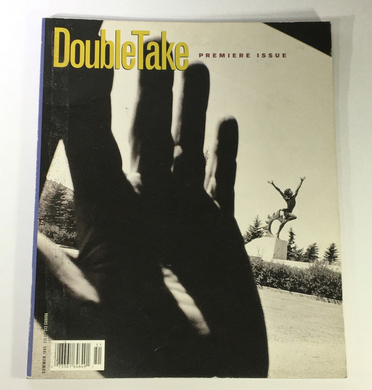 Cover of Double Take Photography Magazine, Summer 1995 - Premier Issue featuring a creative black and white photograph of a hand in front of a sculpture.
