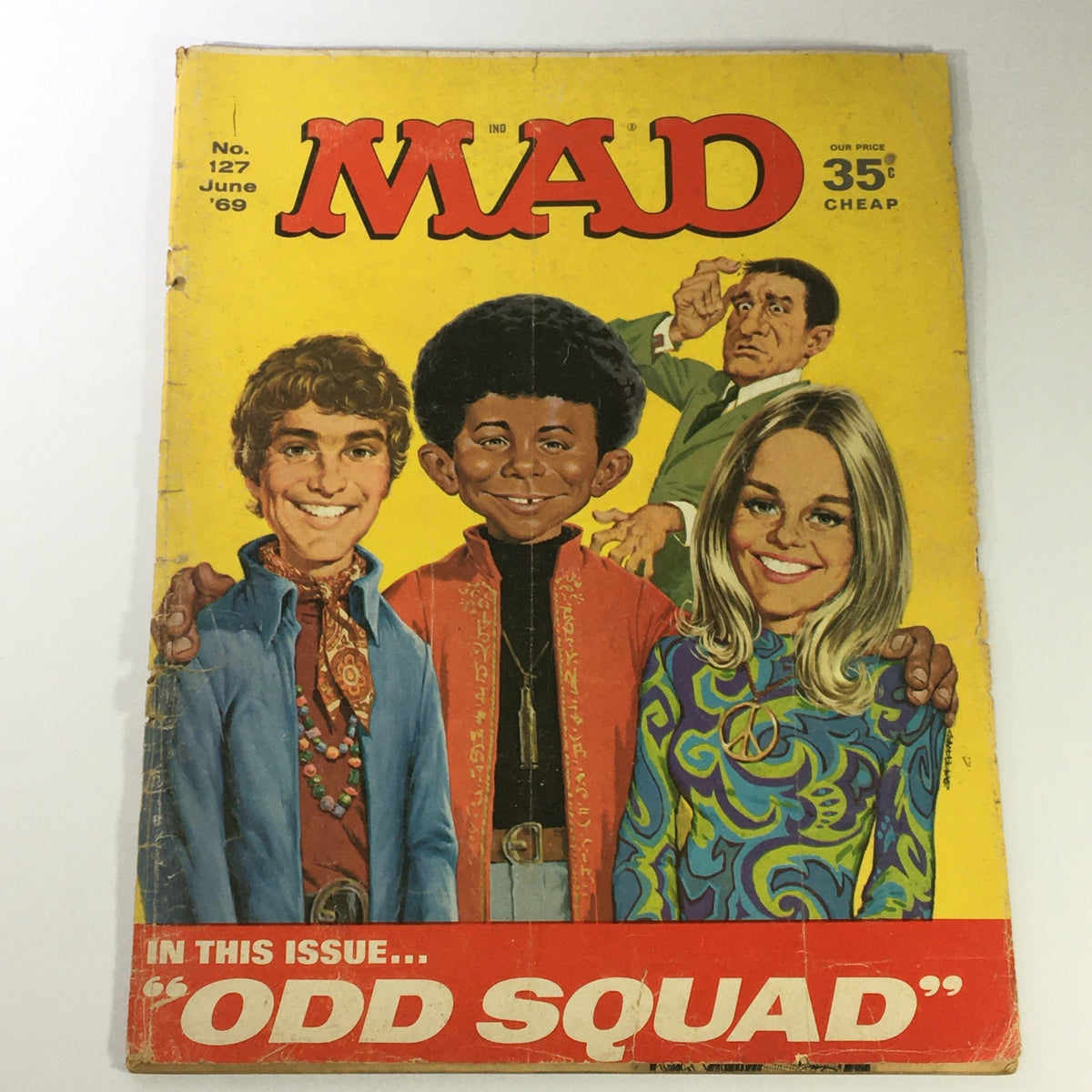 Cover of Mad #127 June 1969 featuring Alfred E. Neuman and characters from the Odd Squad, with colorful illustrations and a playful design.