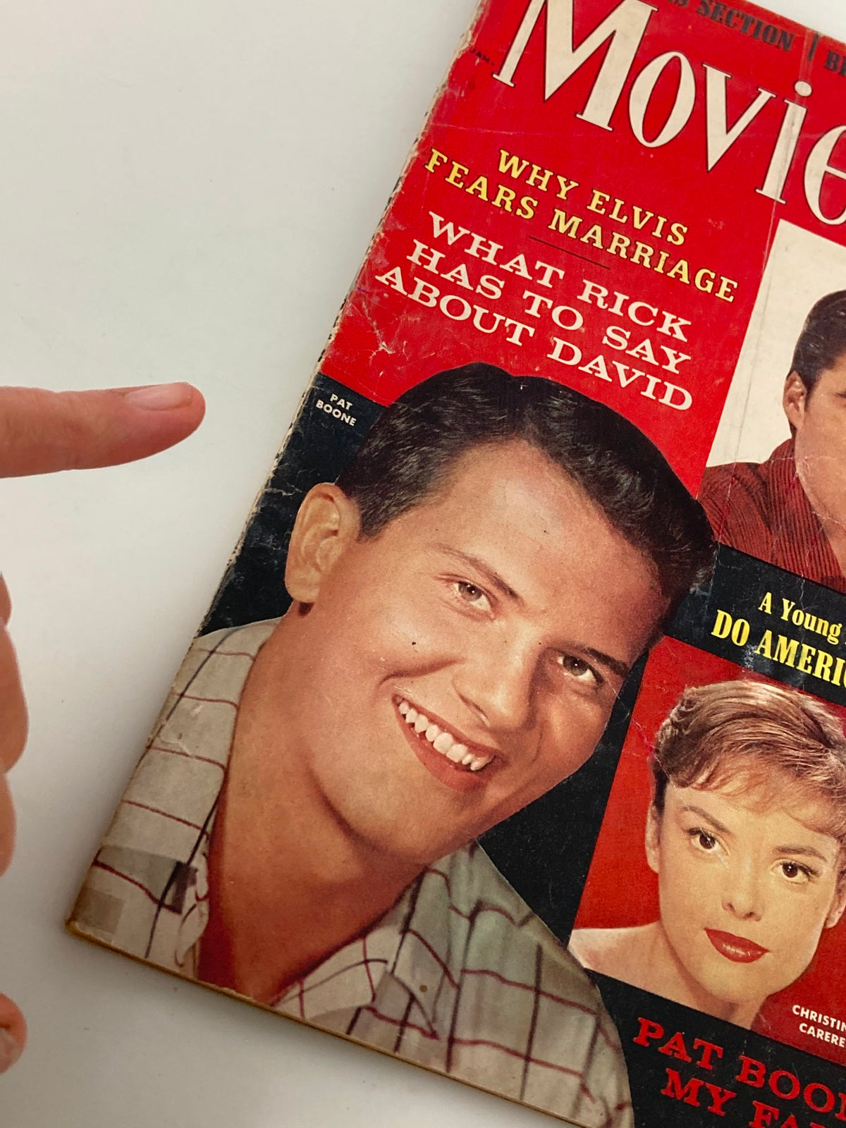 Close-up of the VTG Movie World Magazine January 1959 cover featuring Pat Boone smiling and a highlighted section about Elvis, showcasing the charm and nostalgia of 1950s cinema.