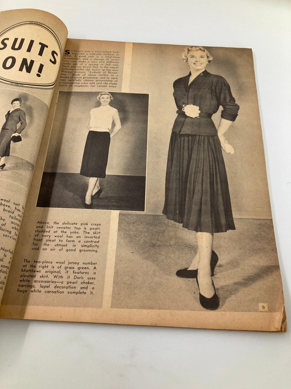 Inside page of VTG Movie Play Magazine May 1951 showcasing fashion styles, featuring models in stylish outfits. This vintage magazine highlights classic cinema fashion trends.