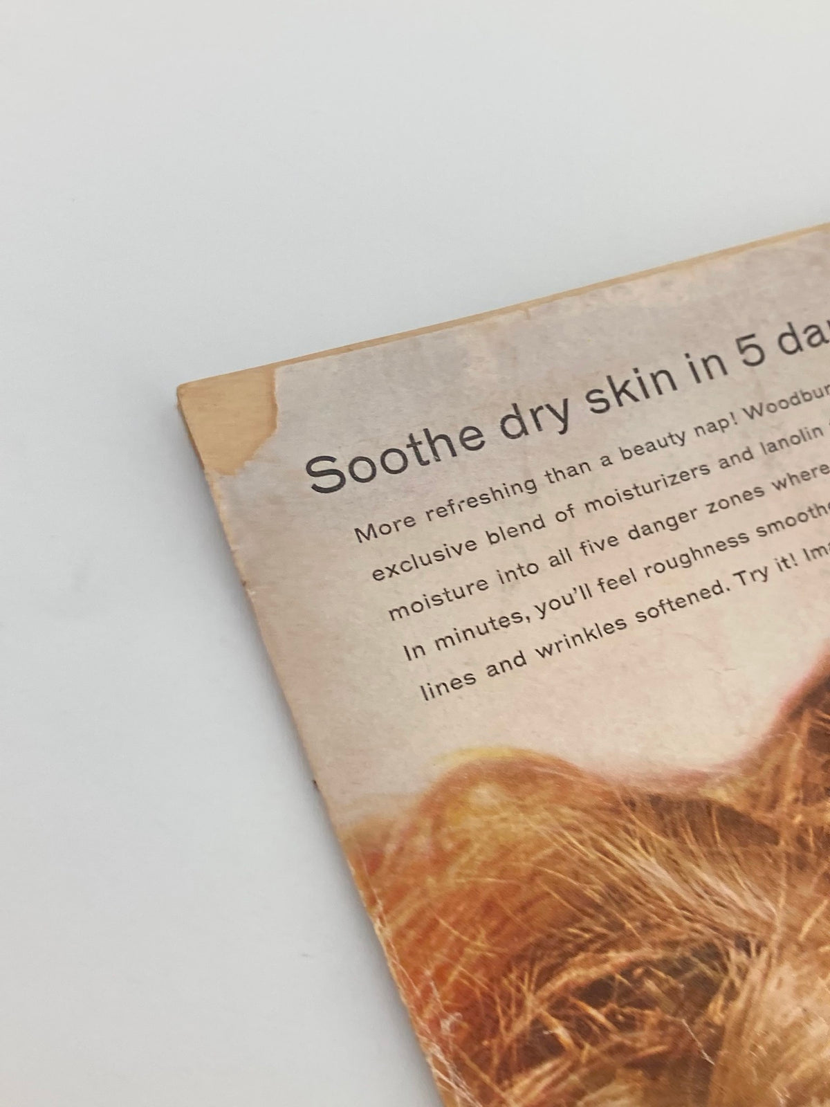 Close-up of the back cover of VTG Modern Screen Magazine December 1958 featuring a vintage advertisement for a skin moisturizer, showcasing typical signs of aging, ideal for collectors of classic magazines and vintage beauty ads.