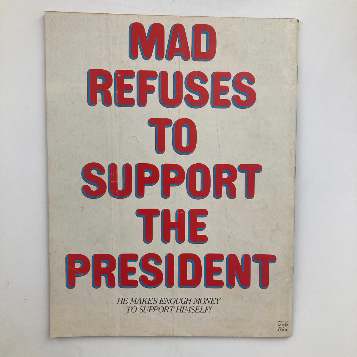 Back cover of Mad Magazine December 1984 No. 251 with bold text stating 'MAD REFUSES TO SUPPORT THE PRESIDENT' showcasing its classic humorous commentary style.