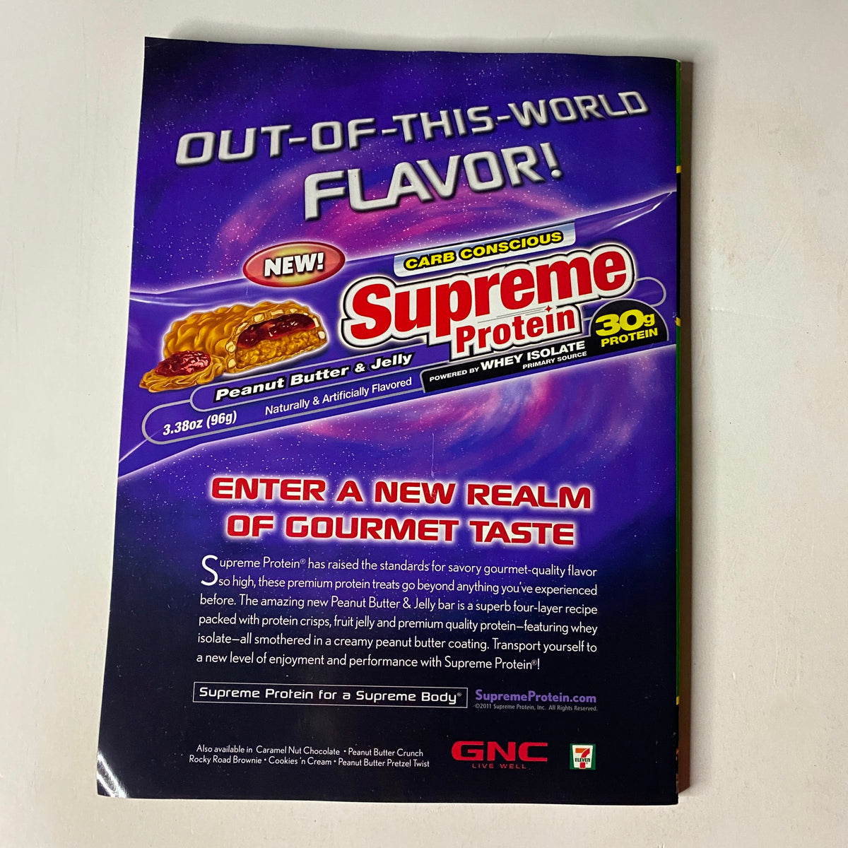 Ad page from MuscleMag International Magazine February 2012, promoting Supreme Protein with a focus on flavor and high protein content.